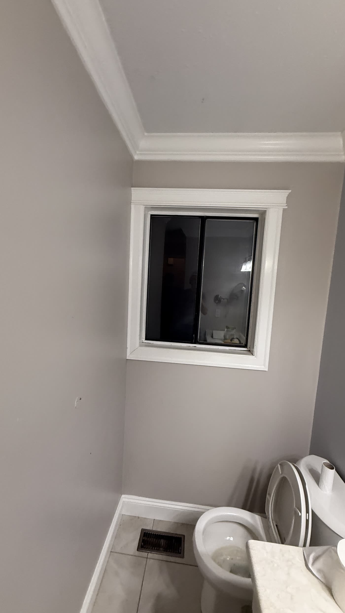 Original Burnaby bathroom window and toilet before renovation