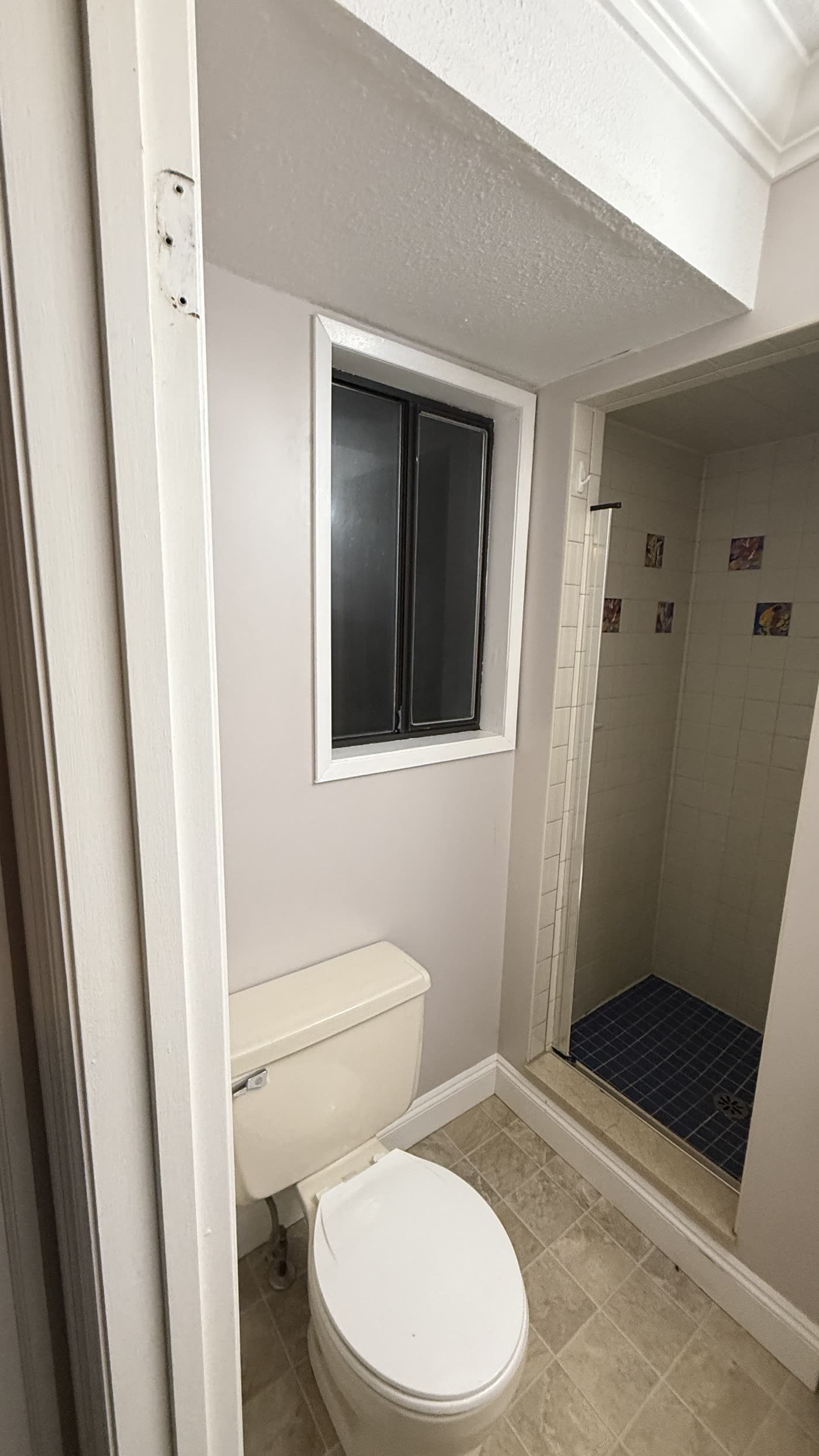 Original shower before full bathroom renovation in Burnaby